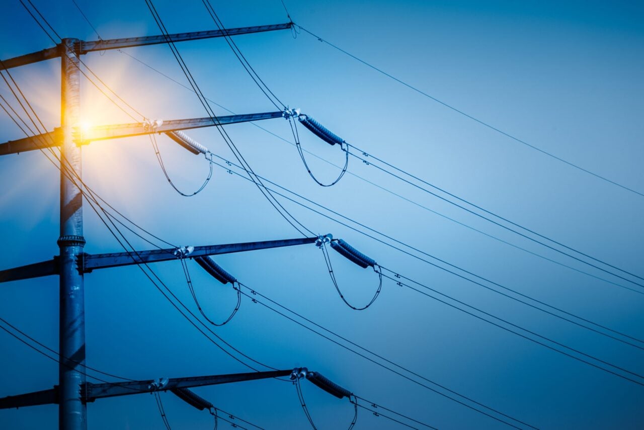 High Voltage Tower Isolated On Sky