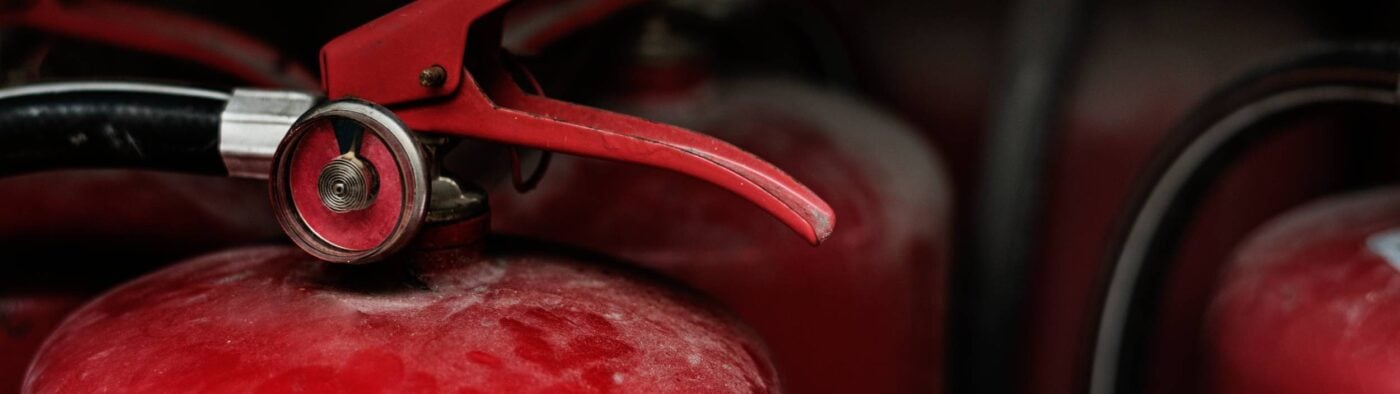 Closeup Red Fire Extinguishers