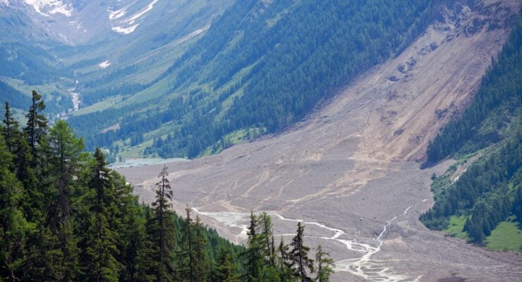 Aerial,View,Of,Rockfall,With,Gravel,And,Lonza,River,At