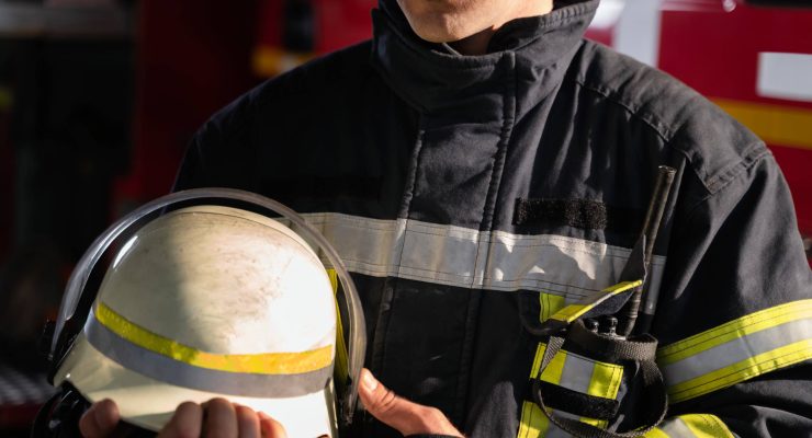 Male Firefighter Station With Suit Safety Helmet